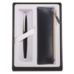 A black pen and a navy blue zip pouch arranged in a box with a light grey interior. The box has a logo.