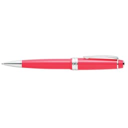 A rollerball pen in light coral polished resin with silver accents and a clip.