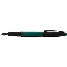 A fountain pen featuring a matt green and matt black lacquer finish, with a clip and a pointed nib.