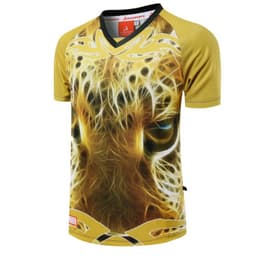 A sublimated t-shirt featuring a striking yellow design with a lion's face and intricate patterns. It includes a logo.