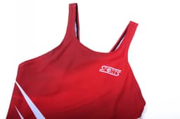 A red one-piece swimming costume with a sporty design and a logo on the front.