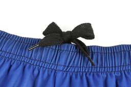 Blue soccer uniform shorts with a black drawstring tie at the waist, featuring a woven texture.