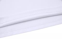 A close-up of a white cotton polo shirt, showcasing the fabric texture and seam details.