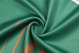 AFL vest in green fabric with orange stripes, featuring a smooth, folded texture. Includes a logo.