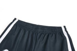 Black sports shorts with white stripes along the sides and an elastic waistband. Features a logo.