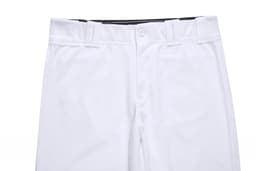 A white pair of baseball/cricket pants with a button closure and waistband. The design is simple with no visible logos.