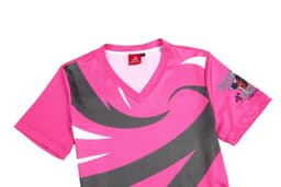 A pink cheerleader uniform with grey accents and a logo on the sleeve. It features a V-neck design.