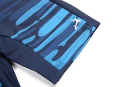 TIGHT SHORTS featuring a blue and navy patterned design, with a logo on the side.