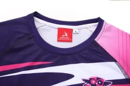 A purple and pink swimming coat with a logo, featuring a high collar and short sleeves.