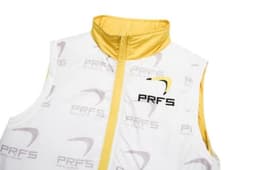 A white and yellow sleeveless winter coat with a zip and a logo. Features a puffer design for warmth.