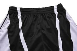 SWIFT SHORTS-LADY featuring a black and white design, with an elastic waistband and sporty styling.