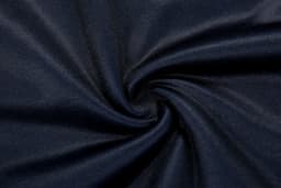 A thick, navy fabric in a swirling pattern, showcasing a smooth texture suitable for a pullover quarter zip product.