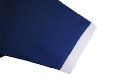 A pair of ice hockey shorts in navy blue with a white trim at the hem. Includes a logo on the garment.