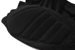 Black soccer goalkeeper pants featuring padded sections for added protection and a textured design.