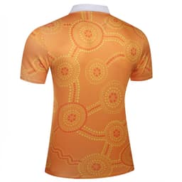 A short-sleeved shirt featuring an orange design with circular dot patterns and a white collar. It has a logo.