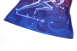 A vibrant blue and purple running suit featuring a digital graphic of a runner in motion and a logo.