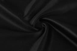 A close-up of black fabric with a smooth, shiny texture, showcasing its soft sheen and flowing folds.