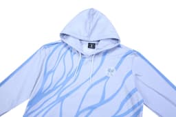 A light blue hoodie featuring a design in darker blue. It has a hood and a logo.