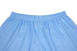Light blue shorts with an elastic waistband, featuring gathered stitching at the waist. The garment has a simple design.