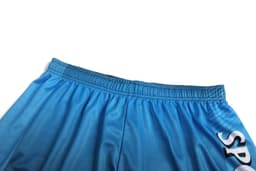 Blue sports shorts featuring an elastic waistband and a logo on the side. Suitable for athletics and recreational wear.