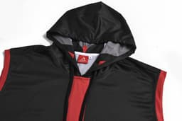 A sleeveless vest in black with red detailing and a hood, featuring a logo on the interior tag.