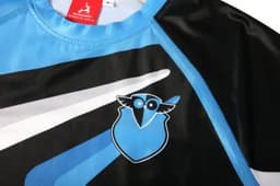 A sports uniform featuring a blue and black design with a logo on the chest, suitable for swimming teams.