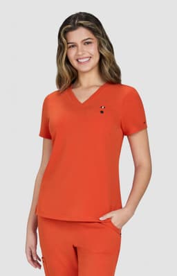 An orange V-neck top with short sleeves, featuring a logo, modelled by a smiling woman.