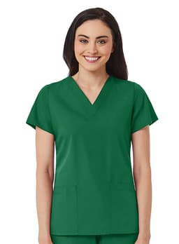 A woman wearing a green V-neck top with short sleeves and two pockets. The design is simple and practical.