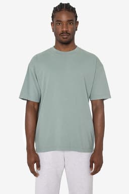 A short sleeve crewneck tee in a soft green colour, featuring a relaxed fit and a branding logo.