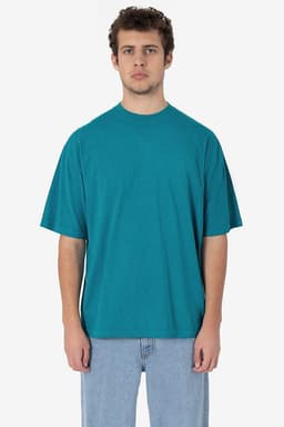 A crewneck T-shirt in teal, featuring short sleeves and a relaxed fit, with a logo.