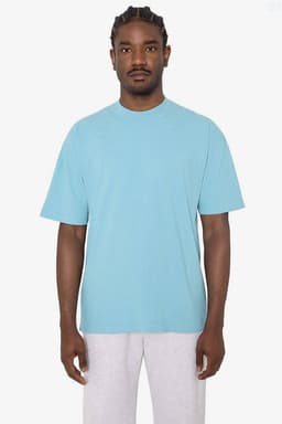 A crewneck t-shirt in light blue, featuring short sleeves and a relaxed fit, with a logo visible.