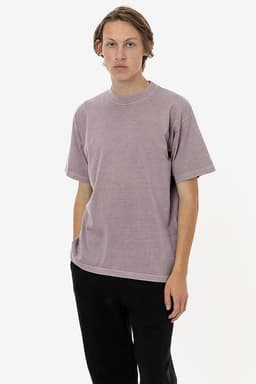 A short sleeve crewneck tee in a muted mauve colour, featuring a plain design and a small logo.