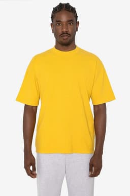 A short sleeve crewneck tee in bright yellow, featuring a relaxed fit and a logo on the chest.