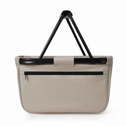 A beige shopping bag with a black handle and a zippered pocket on the back.