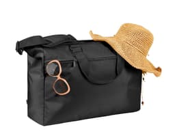 A black duffle bag with a woven straw hat and pink sunglasses resting against it. The bag features a logo.
