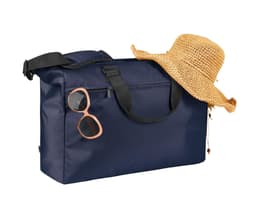 A navy duffle bag with a straw hat and sunglasses resting on top, featuring a logo.