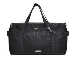 A black duffle bag with two handles, a shoulder strap, and a logo. Features zippers and side pockets.