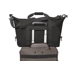 A black duffle bag with a detachable shoulder strap and luggage handle, featuring a grey zippered compartment.