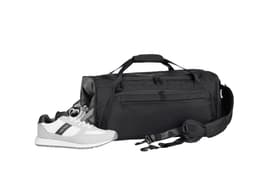 A black duffle bag with a shoulder strap, accompanied by a pair of white and grey sneakers. The bag features a logo.
