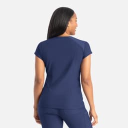 A navy blue banded v-neck top with short sleeves, featuring a fitted silhouette and a simple design.