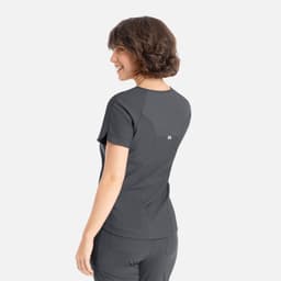 A women's grey t-shirt featuring a Y-neck design and a logo on the back, shown from the back.