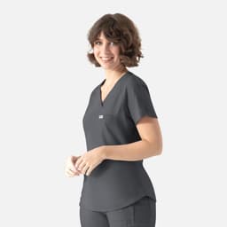 A dark grey Y-neck top with short sleeves and a small pocket, featuring a branding logo.
