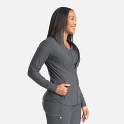 A full zip track jacket in grey, featuring a fitted design and a logo.