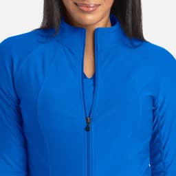 A blue full zip track jacket with a high collar and a zipper design, featuring a logo on the chest.