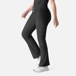 A pair of black bootcut pants with an elastic waistband and pockets, featuring a logo on one side.