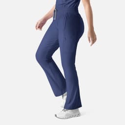 A pair of navy bootcut pants with an elastic waistband and side pockets, featuring a logo.