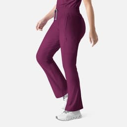 A pair of bootcut pants in a rich burgundy colour, featuring side pockets and an elastic waistband.