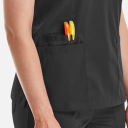 A women's black double V-neck top featuring a pocket with orange and green pens.