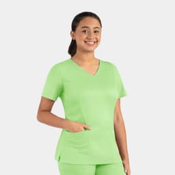 A woman wearing a bright green Matrix Women's Double V-Neck Top with short sleeves and a pocket.