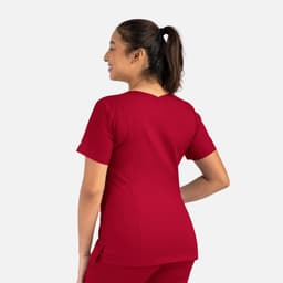 A red women's double V-neck top with short sleeves, featuring a logo on the sleeve.